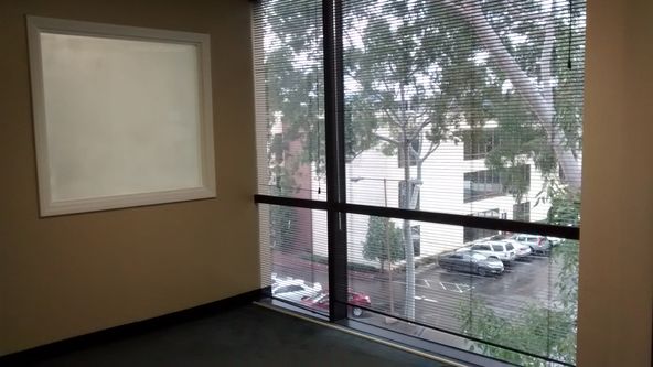 RECEPTION, TWO PRIVATE OFFICES AND OPEN SPACE. NICE LAYOUT. CORNER SUITE.